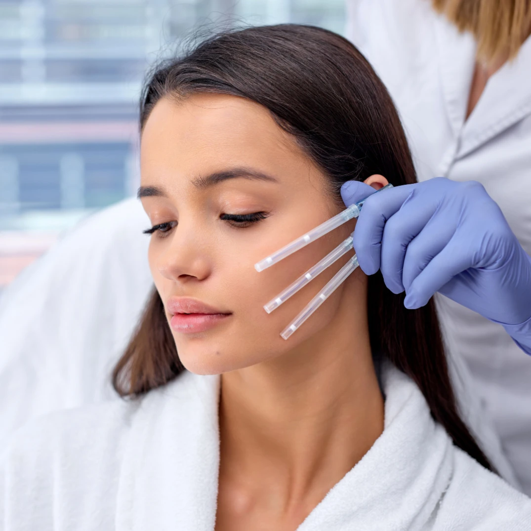 Beautiful woman during a thread procedure