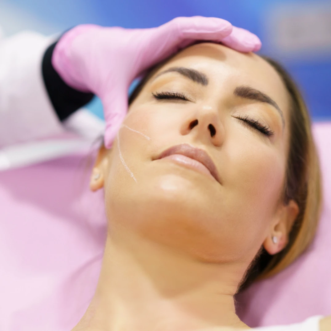 Beautiful woman during a thread procedure